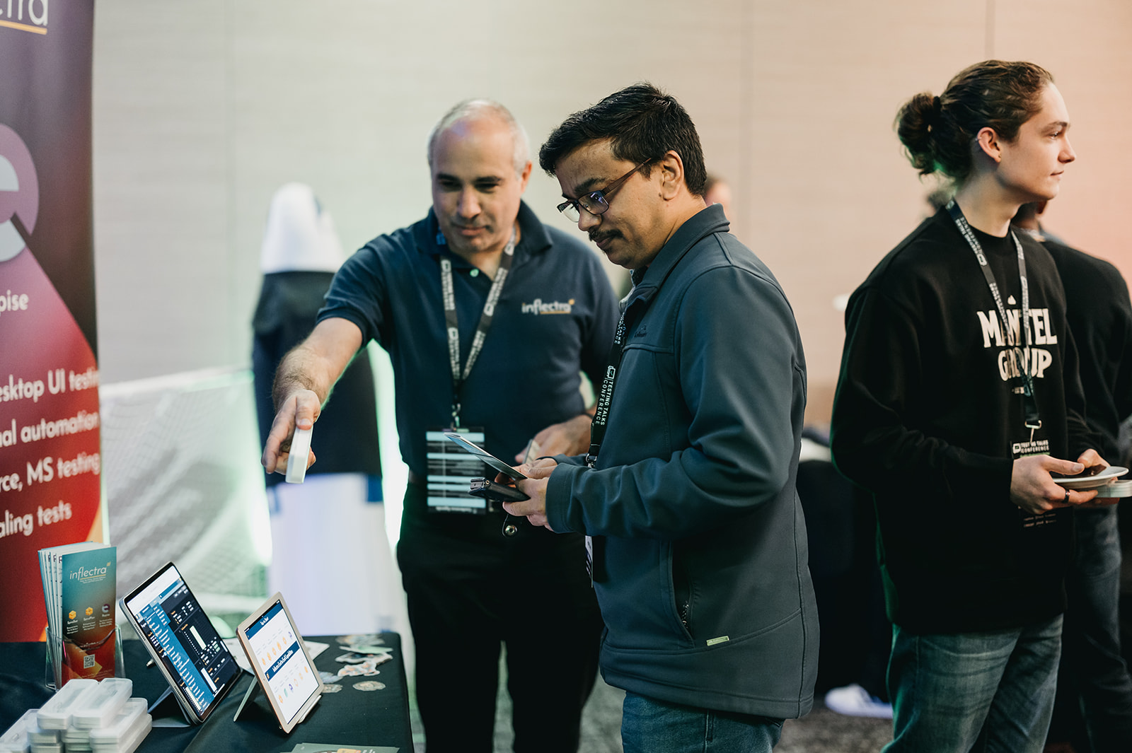 ceo-of-inflectra-adam-sandman-at-booth-in-testing-talks-sydney-image