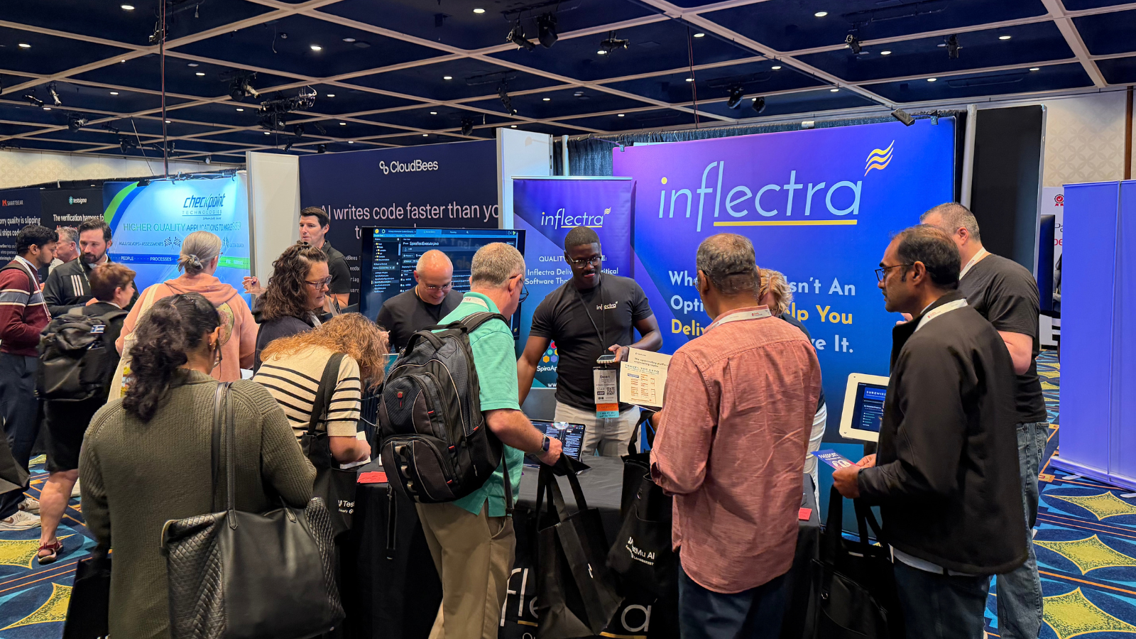 STARWEST 2026 attendees visiting Inflectra's booth at the expo